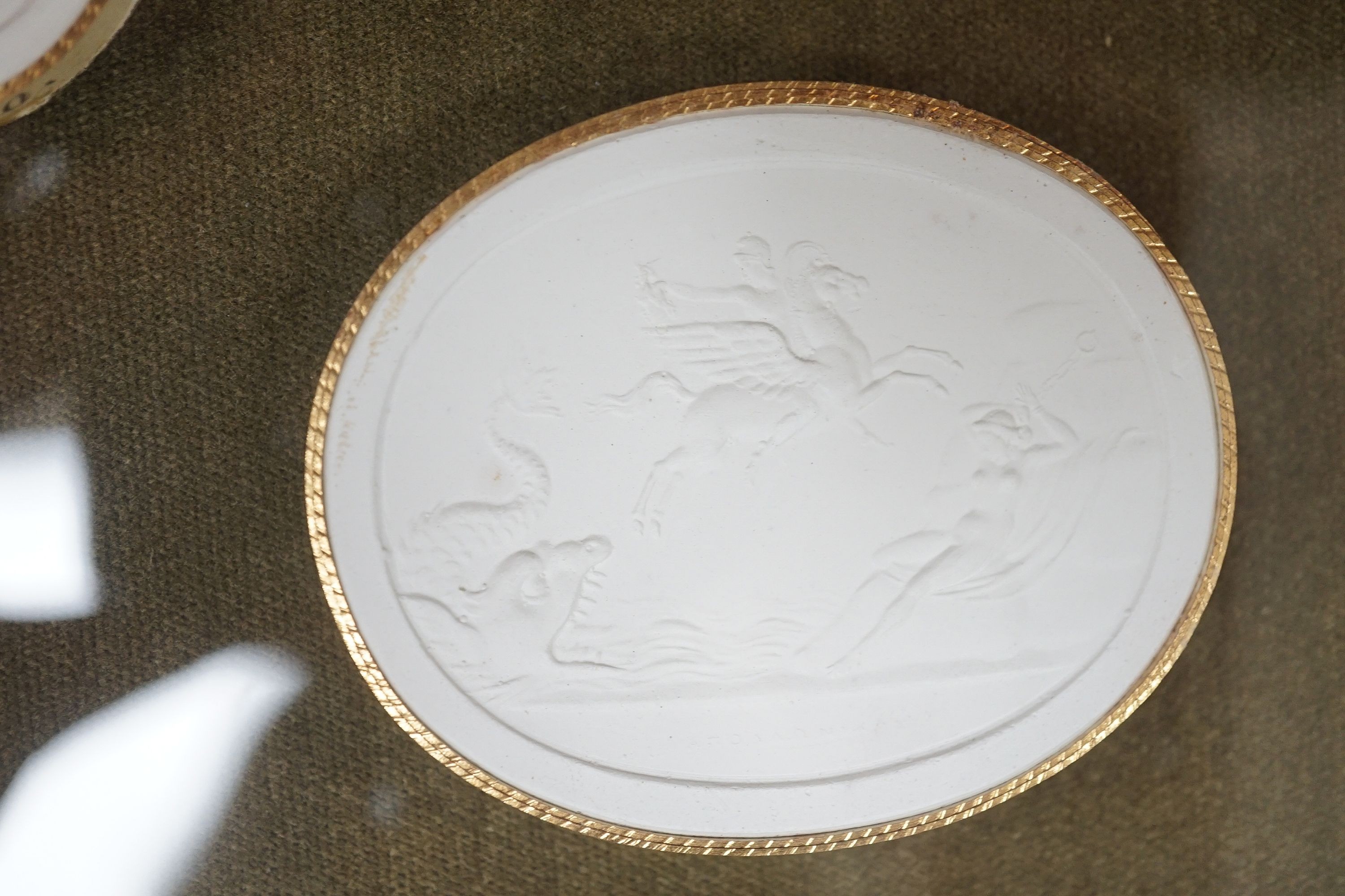 A reproduction cased set of seven classical plaster gems